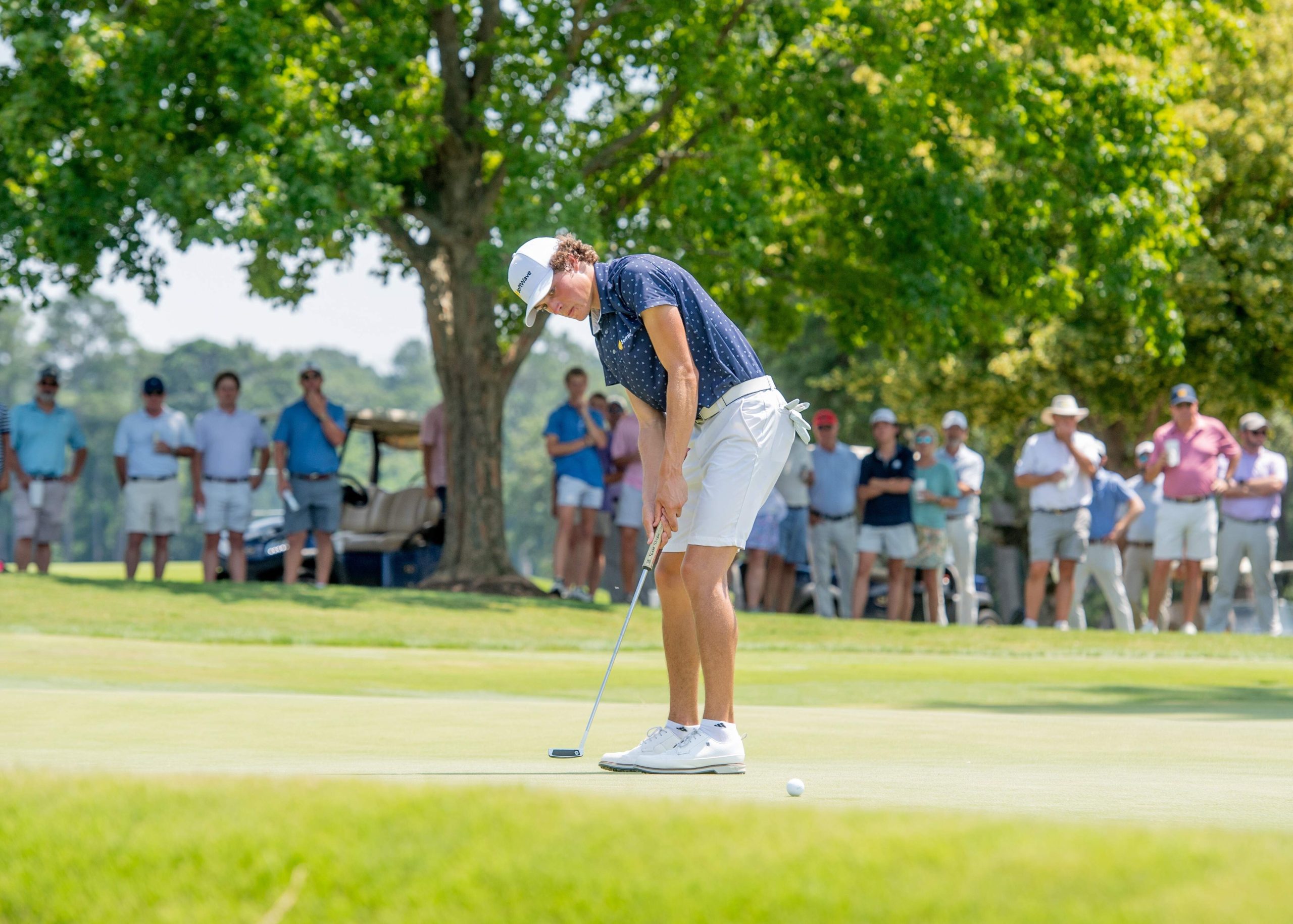 Jake Peacock putts to win the 2024 Georgia Amateur. (Photo Kate Awtrey-King)